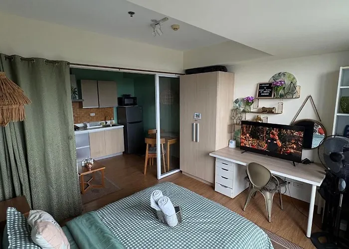Staycation By Rhen Apartment